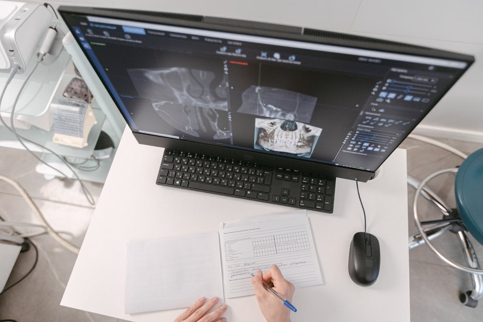 A desk with scan images on a computer screen