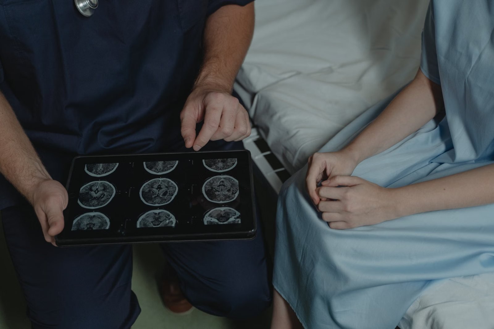 A man looking at MRI scan films