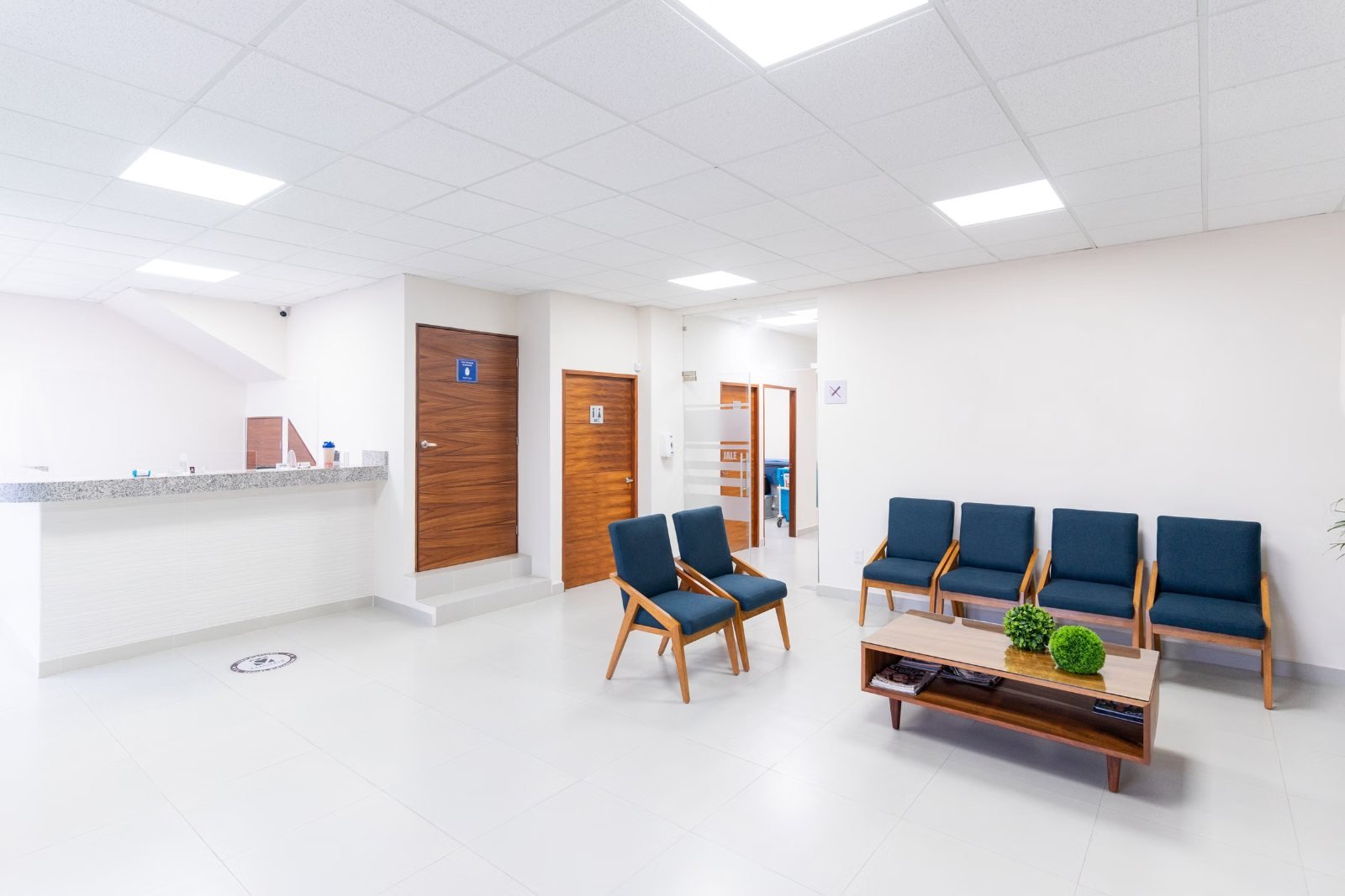 An empty clinic reception and waiting area