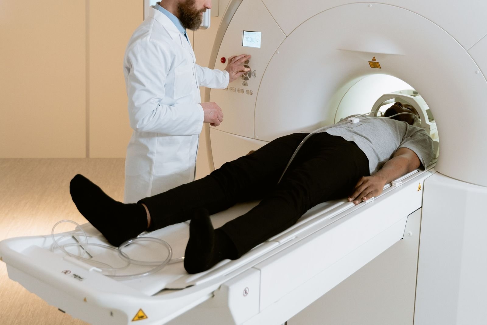 A patient being moved feet first into an MRI scanner